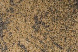 Granite carpet tile in Venetian Gold rich warm stone‑inspired finish
